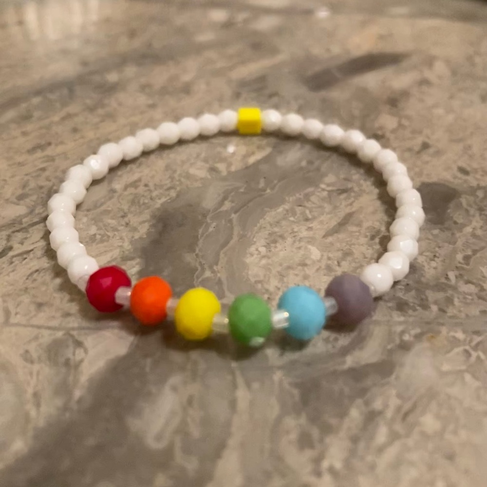 6”-6 1/4”wrist. 6mm Rainbow 4mm white fire-polish glass bead stretch bracelet.